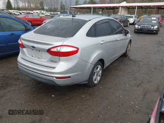 2015 Ford Fiesta SE with VIN 3FADP4BJ7FM136387, listed as a IAAI auction lot 41671370 with 181,973 mi miles. Bid and sale history available at carsss.com. Image 4.