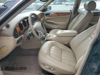 1999 Jaguar XJ with VIN SAJHX1044XC865054, listed as a Copart auction lot 57825325 with 71,145 mi miles and Clean title. Bid and sale history available at DreamBid. Image 7.