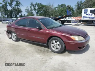 2007 Ford Taurus SE with VIN 1FAFP53U17A151246, listed as a Copart auction lot 60221955 with 284,321 mi miles and Salvage title. Bid and sale history available at DreamBid. Image 4.
