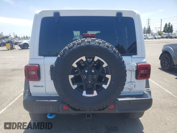 2024 Jeep Wrangler Rubicon X с VIN 1C4RJXR67RW242301, выставлен на аукционе Copart как лот 61178995 с пробегом 36 998 миль миль и Чистый • Clean title. История ставок и продаж доступна на DreamBid. Изображение 6.