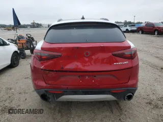 2020 Alfa Romeo Stelvio z VIN ZASPAJAN1L7C92420, wystawiony jako Copart lot #41972755 z przebiegiem Nie podano mil oraz Nie do naprawy. Historia ofert i sprzedaży dostępna na DreamBid. Obrazek 6.