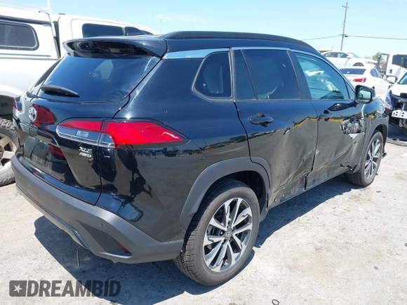 2022 Toyota Corolla Cross XLE with VIN 7MUEAABG3NV042742, listed as a IAAI auction lot 42595052 with 54,299 mi miles and . Bid and sale history available at DreamBid. Image 4.
