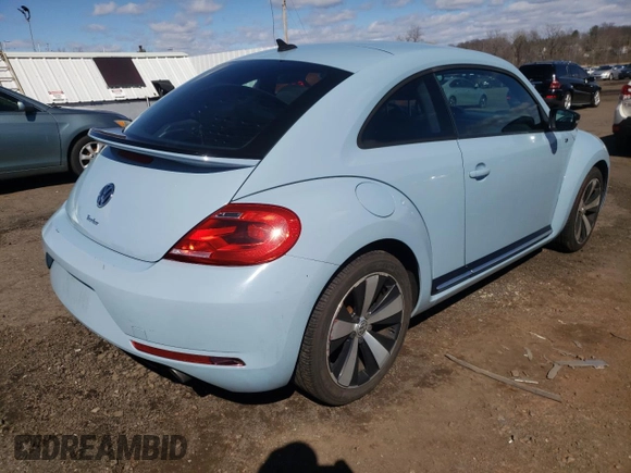 2014 Volkswagen Beetle Turbo R-Line with VIN 3VWVT7AT1EM639374, listed as a Copart auction lot 50230785 with 54,818 mi miles and Salvage Title. Bid and sale history available at DreamBid. Image 3.
