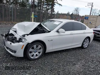 2013 BMW 5 Series 528i xDrive with VIN WBAXH5C54DDW13438, listed as a IAAI auction lot 41851954 with 122,653 mi miles. Bid and sale history available at carsss.com. Image 14.
