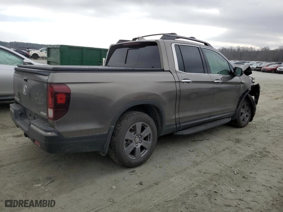 2020 Honda Ridgeline RTL-E with VIN 5FPYK3F73LB001983, listed as a Copart auction lot 44222325 with 86,782 mi miles and Salvage Title. Bid and sale history available at carsss.com. Image 3.