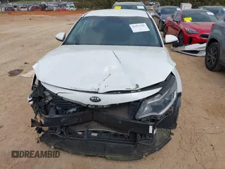 2017 Kia Optima LX z VIN 5XXGT4L39HG133028, wystawiony jako IAAI lot #41957226 z przebiegiem 92 366 mil mil oraz . Historia ofert i sprzedaży dostępna na DreamBid. Obrazek 12.