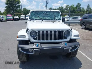 2024 Jeep Wrangler Sahara with VIN 1C4RJXP64RW270463, listed as a IAAI auction lot 42598295 with 36,251 mi miles and . Bid and sale history available at DreamBid. Image 12.