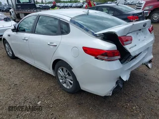 2018 Kia Optima LX with VIN KNAGT4L33J5232905, listed as a IAAI auction lot 42333610 with 111,423 mi miles and . Bid and sale history available at DreamBid. Image 3.