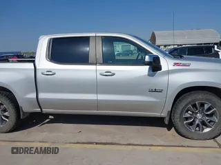2020 Chevrolet Silverado 1500 LT with VIN 1GCUYDED4LZ240844, listed as a IAAI auction lot 41864044 with 128,665 mi miles and . Bid and sale history available at DreamBid. Image 14.