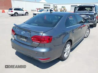 2013 Volkswagen Jetta Sedan Hybrid SE with VIN 3VW637AJ9DM228757, listed as a IAAI auction lot 41990054 with 176,365 mi miles. Bid and sale history available at carsss.com. Image 4.
