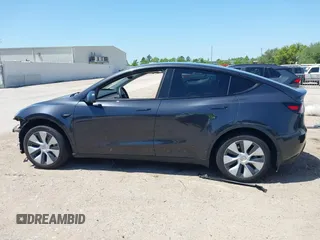 2024 Tesla Model Y with VIN 7SAYGDED2RF040745, listed as a IAAI auction lot 41986613 with 9,778 mi miles and . Bid and sale history available at DreamBid. Image 14.