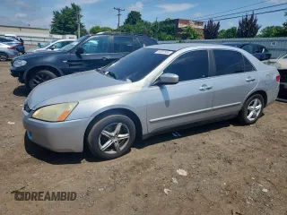 2003 Honda Accord LX with VIN 1HGCM56333A081804, listed as a Copart auction lot 64087955 with 221,932 mi miles and Salvage title. Bid and sale history available at DreamBid. Image 1.