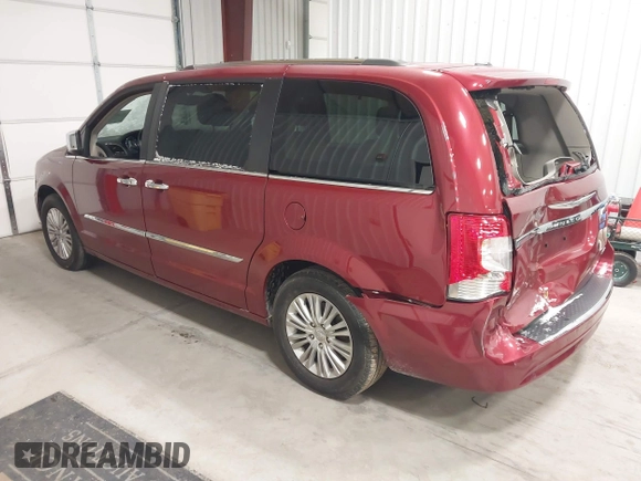 2015 Chrysler Town & Country Limited Platinum with VIN 2C4RC1GGXFR597180, listed as a IAAI auction lot 41374817 with 90,088 mi miles and . Bid and sale history available at DreamBid. Image 3.