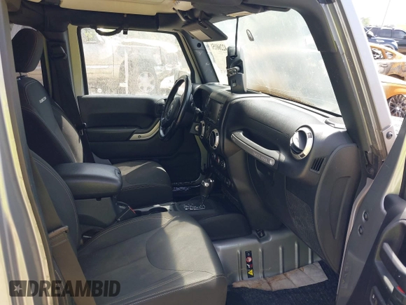 2016 Jeep Wrangler Unlimited Rubicon Hard Rock with VIN 1C4BJWFG6GL265320, listed as a IAAI auction lot 42260151 with Not provided miles and . Bid and sale history available at DreamBid. Image 5.