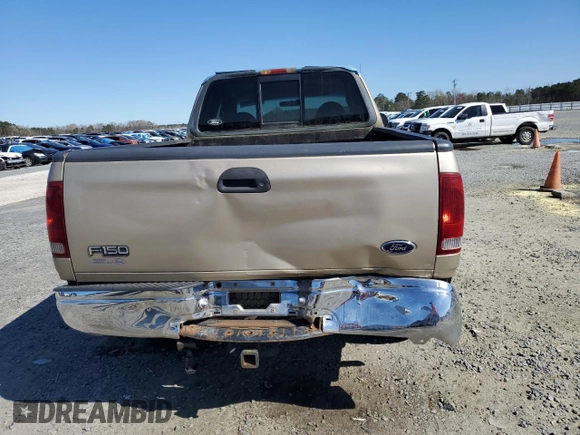 1999 Ford F-150 XL with VIN 1FTRX18LXXNA59898, listed as a Copart auction lot 49326055 with 0 mi miles and Salvage Title. Bid and sale history available at carsss.com. Image 6.