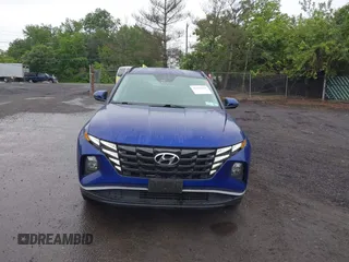 2022 Hyundai Tucson SEL z VIN 5NMJBCAE1NH026298, wystawiony jako IAAI lot #42365533 z przebiegiem 44 080 mil mil oraz . Historia ofert i sprzedaży dostępna na DreamBid. Obrazek 6.