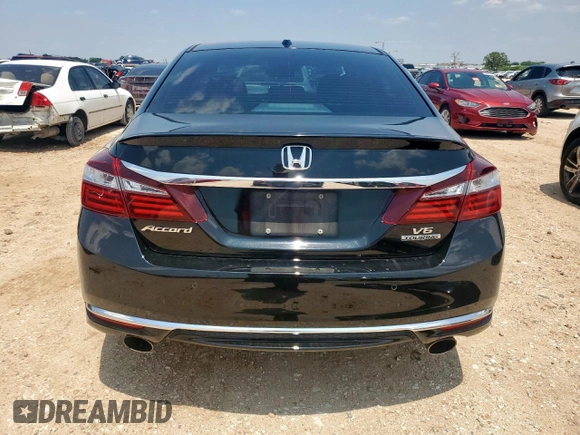 2016 Honda Accord Touring with VIN 1HGCR3F9XGA012737, listed as a Copart auction lot 58274935 with 69,715 mi miles and Salvage title. Bid and sale history available at DreamBid. Image 6.