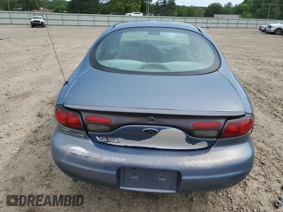 1999 Ford Taurus SE z VIN 1FAFP53U0XG322565, wystawiony jako Copart lot #54560285 z przebiegiem 164 300 mil mil oraz Szkoda całkowita • Salvage title. Historia ofert i sprzedaży dostępna na DreamBid. Obrazek 6.
