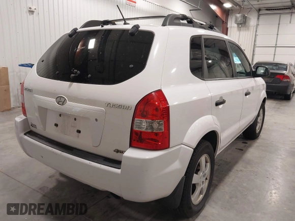 2006 Hyundai Tucson GL with VIN KM8JM72BX6U465737, listed as a IAAI auction lot 42203453 with 162,107 mi miles. Bid and sale history available at carsss.com. Image 4.