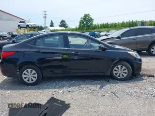 2017 Hyundai Accent SE z VIN KMHCT4AE1HU342868, wystawiony jako IAAI lot #42403205 z przebiegiem 54 890 mil mil oraz . Historia ofert i sprzedaży dostępna na DreamBid. Obrazek 13.