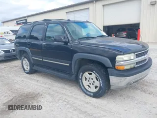 2004 Chevrolet Tahoe LT with VIN 1GNEC13Z74J314927, listed as a IAAI auction lot 41231288 with 195,809 mi miles. Bid and sale history available at carsss.com. Image 1.