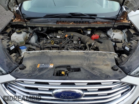 2020 Ford Edge SEL z VIN 2FMPK3J90LBB01559, wystawiony jako Copart lot #61365305 z przebiegiem 120 050 mil mil oraz Czysty tytuł • Clean title. Historia ofert i sprzedaży dostępna na DreamBid. Obrazek 12.