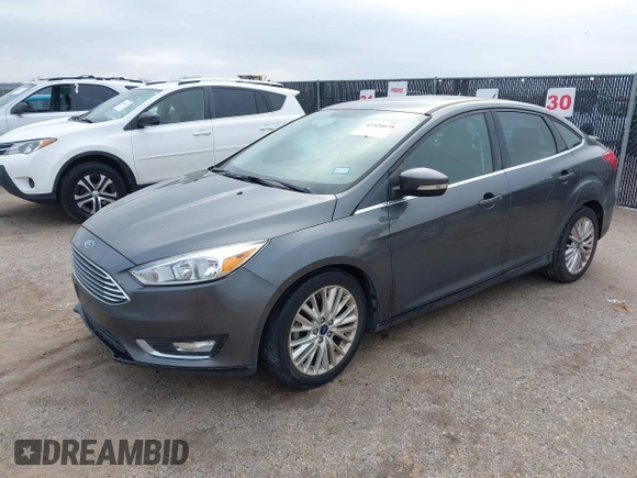 2018 Ford Focus Titanium with VIN 1FADP3J29JL232911, listed as a IAAI auction lot 41524078 with 90,764 mi miles and . Bid and sale history available at DreamBid. Image 17.