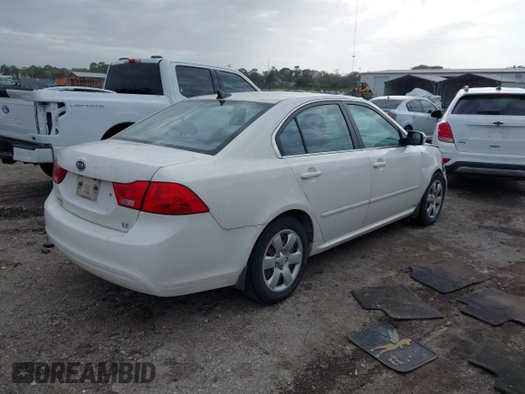 2009 Kia Optima LX z VIN KNAGE228395333286, wystawiony jako IAAI lot #41737577 z przebiegiem 113 152 mil mil oraz . Historia ofert i sprzedaży dostępna na DreamBid. Obrazek 4.