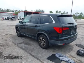 2017 Honda Pilot EX-L with VIN 5FNYF6H50HB033968, listed as a IAAI auction lot 42400720 with 119,597 mi miles and . Bid and sale history available at DreamBid. Image 3.