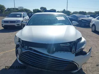 2016 Toyota Avalon Limited with VIN 4T1BK1EB1GU207322, listed as a IAAI auction lot 42030270 with 77,127 mi miles and . Bid and sale history available at carsss.com. Image 12.