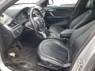 2018 BMW X1 sDrive28i with VIN WBXHU7C32J5H44215, listed as a Copart auction lot 87356474 with 121,828 mi miles and Salvage Title. Bid and sale history available at carsss.com. Image 7.