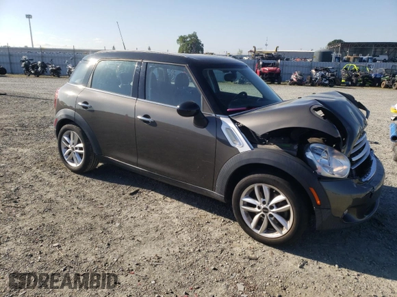 2012 MINI Countryman with VIN WMWZB3C58CWM03815, listed as a Copart auction lot 50097405 with 84,137 mi miles and Salvage Title. Bid and sale history available at DreamBid. Image 4.