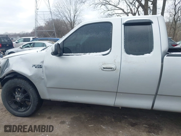2002 Ford F-150 XL with VIN 1FTRX17212NA45843, listed as a IAAI auction lot 41575856 with 136,570 mi miles. Bid and sale history available at carsss.com. Image 14.