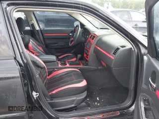 2010 Dodge Charger SXT with VIN 2B3CA3CV5AH234166, listed as a IAAI auction lot 42086386 with 120,368 mi miles. Bid and sale history available at carsss.com. Image 5.