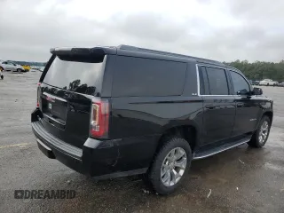 2016 GMC Yukon XL SLE with VIN 1GKS1FKCXGR479666, listed as a Copart auction lot 46640135 with 106,345 mi miles and Salvage Title. Bid and sale history available at carsss.com. Image 3.