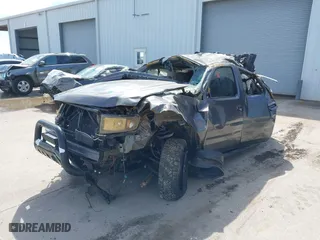 2012 Honda Ridgeline RTS with VIN 5FPYK1F4XCB451706, listed as a IAAI auction lot 40414404 with 153,444 mi miles. Bid and sale history available at carsss.com. Image 2.