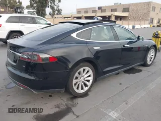 2016 Tesla Model S 70 with VIN 5YJSA1E11GF132015, listed as a IAAI auction lot 41408676 with 137,271 mi miles and . Bid and sale history available at DreamBid. Image 4.