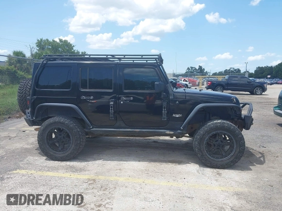 2012 Jeep Wrangler Unlimited Altitude with VIN 1C4HJWEG5CL161049, listed as a IAAI auction lot 42629330 with 217,147 mi miles and . Bid and sale history available at DreamBid. Image 13.