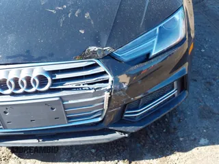 2018 Audi A4 Premium with VIN WAUKMAF41JN018702, listed as a IAAI auction lot 41770021 with 68,128 mi miles. Bid and sale history available at carsss.com. Image 6.