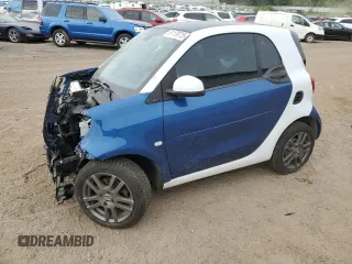 2016 Smart fortwo Passion with VIN WMEFJ5DA9GK062214, listed as a Copart auction lot 61179715 with 58,152 mi miles and Clean title. Bid and sale history available at DreamBid. Image 1.