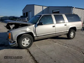 1999 GMC Suburban with VIN 3GKEC16R3XG541577, listed as a Copart auction lot 79191264 with 209,849 mi miles and Salvage Title. Bid and sale history available at DreamBid. Image 1.