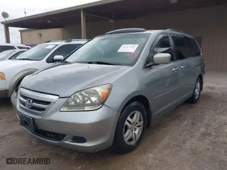 2005 Honda Odyssey EX-L with VIN 5FNRL38745B035909, listed as a IAAI auction lot 41717426 with 292,297 mi miles. Bid and sale history available at carsss.com. Image 2.