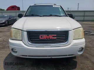 2003 GMC Envoy SLE z VIN 1GKDT13S732228585, wystawiony jako Copart lot #58764565 z przebiegiem 151 107 mil mil oraz Szkoda całkowita • Salvage title. Historia ofert i sprzedaży dostępna na DreamBid. Obrazek 5.