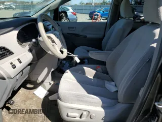 2014 Toyota Sienna LE AAS with VIN 5TDKK3DC6ES511466, listed as a Copart auction lot 52517555 with 142,744 mi miles and Salvage Title. Bid and sale history available at DreamBid. Image 7.