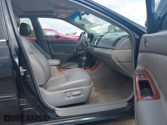 2005 Toyota Camry LE with VIN 4T1BF32K15U091945, listed as a IAAI auction lot 42124503 with 212,951 mi miles and . Bid and sale history available at DreamBid. Image 5.