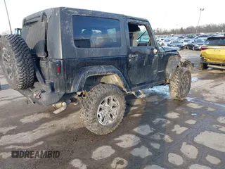 2009 Jeep Wrangler Rubicon with VIN 1J8GA641X9L706706, listed as a IAAI auction lot 41520129 with 176,345 mi miles. Bid and sale history available at carsss.com. Image 4.