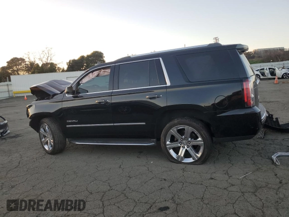 2018 GMC Yukon Denali with VIN 1GKS1CKJ3JR297926, listed as a Copart auction lot 88597415 with 0 mi miles and Salvage Title. Bid and sale history available at carsss.com. Image 2.