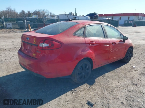 2012 Ford Fiesta SE with VIN 3FADP4BJ3CM155725, listed as a IAAI auction lot 41795297 with 128,517 mi miles. Bid and sale history available at carsss.com. Image 4.