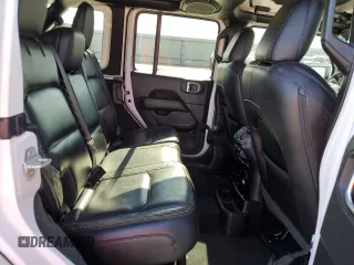 2021 Jeep Wrangler Unlimited Sahara High Altitude z VIN 1C4HJXEGXMW597689, wystawiony jako Copart lot #72390024 z przebiegiem 33 200 mil mil oraz Szkoda całkowita • Salvage title. Historia ofert i sprzedaży dostępna na DreamBid. Obrazek 11.