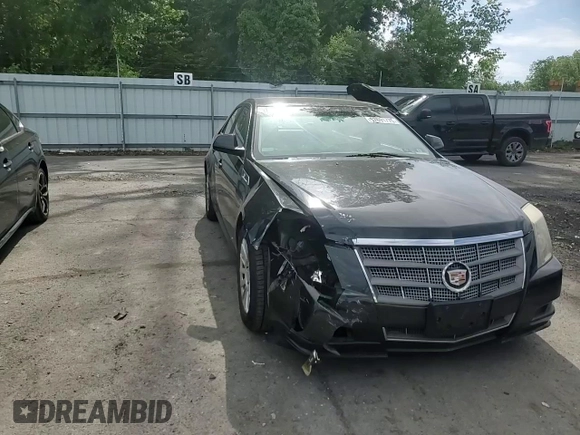 2011 Cadillac CTS Luxury z VIN 1G6DE5EY4B0102325, wystawiony jako Copart lot #57691775 z przebiegiem 157 711 mil mil oraz Szkoda całkowita • Salvage title. Historia ofert i sprzedaży dostępna na DreamBid. Obrazek 13.